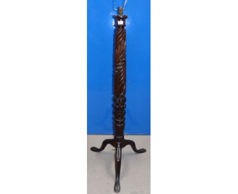 A carved rope twist mahogany torchère, converted to standard lamp