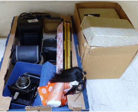 An early Zeiss Ikon folding camera; 4 other cameras; a Japanese doll and screen group