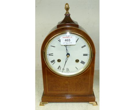 A reproduction brass mounted arch top bracket clock with chiming movement, by Camille, London