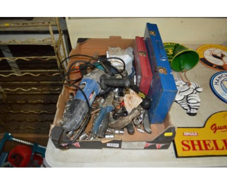 A box containing various hand tools to include an angle grinder