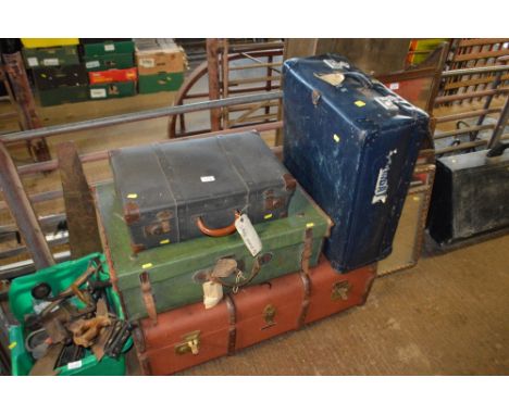 Four various suitcases to include a travelling trunk