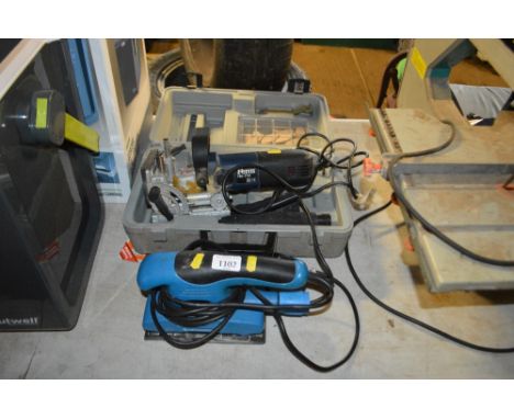 An orbital sander; together with a Ferm biscuit joiner