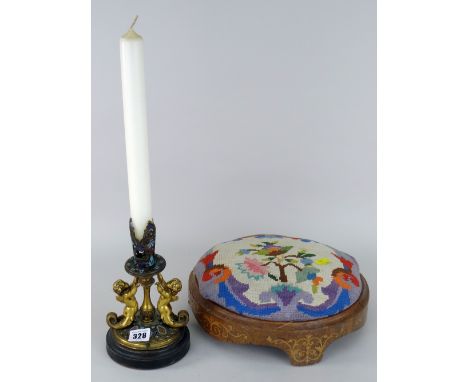 19TH CENTURY GILT METAL AND CLOISONNE CANDLESTICK HOLDER of Neo-classical form of two mermaid type cherubs mounted to circula
