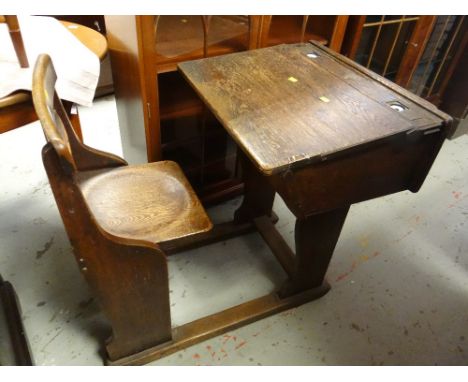 GOOD VINTAGE OAK SCHOOL DESK with folding seat and double inkwells