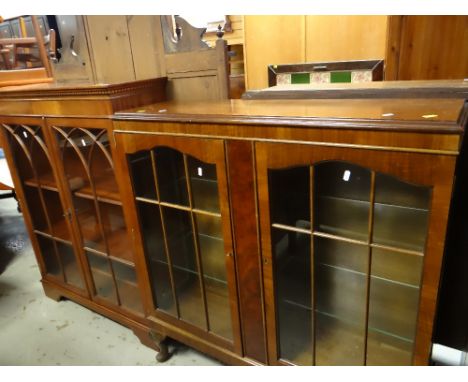 REPRODUCTION MAHOGANY BOOKCASE together with a vintage two-glass door display cabinet (2)