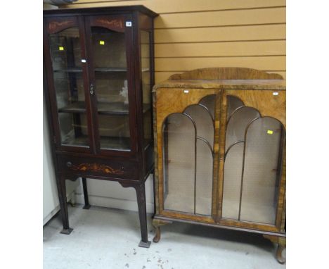 TWO VINTAGE DISPLAY CABINETS one on raised feet with a centre drawer