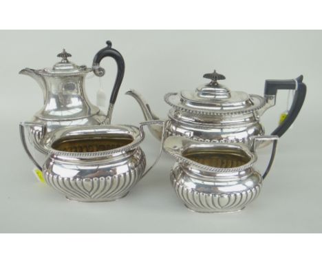 EARLY TWENTIETH CENTURY FOUR-PIECE SILVER MATCHING TEASET comprising teapot, sucrier, cream jug, water jug, London, 48 troy o