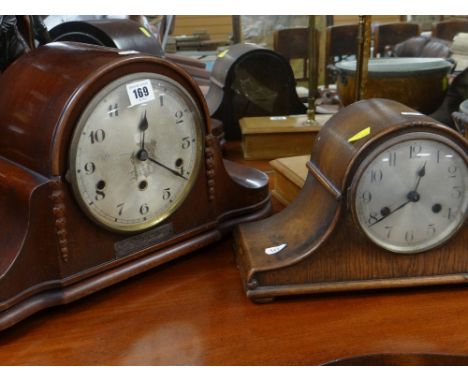 LARGE MAHOGANY DOME TOP MANTEL CLOCK with circular face, together with a similar smaller oak dome clock mantle clock