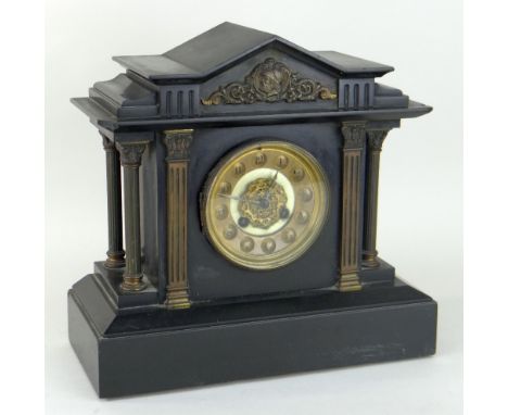 VICTORIAN BLACK SLATE ARCHITECTURAL MANTEL CLOCK of classical form with filigree detail to the circular dial and with gilt me