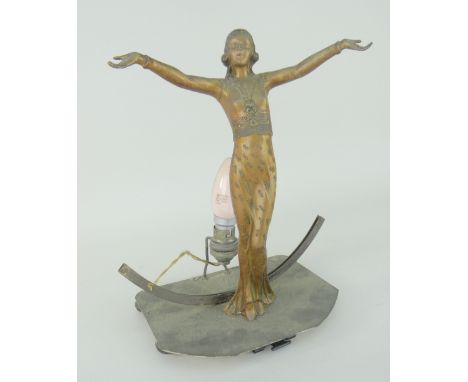 VINTAGE ART DECO FIGURAL METALLIC TABLE LAMP in a form of a female in long elegant dress with arms outstretched on a platform