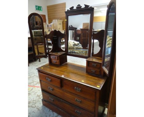 VINTAGE MAHOGANY TRIPLE MIRROR BACK DRESSING TABLE with shelving and drawers to the top, two short above two long drawers, 17