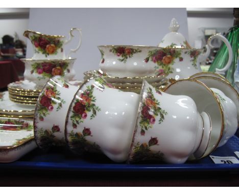 A Royal Albert 'Old County Roses' Tea Service, comprising tea pot, milk jug and sugar basin, two cake plates, six tea plates,