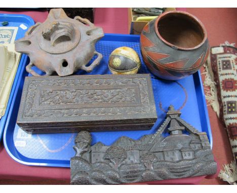 A Turkish Oil Lamp, rectangular carved box, continental carving of houses, pottery bowl:- One Tray