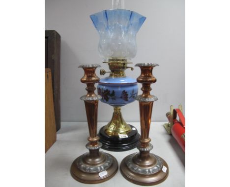 A XIX Century Oil Lamp, with blue tint shade with floral decoration, glass funnel, glass well, with painted floral decoration