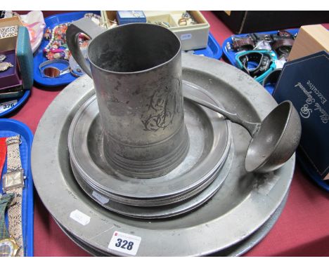 Two XVIII Century Pewter Plates, 24cm diameter, bearing touchmarks and monogram, two other larger and dish, four Tambornino d