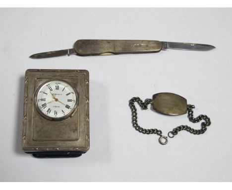 A Modern Hallmarked Silver Mounted Miniature Easel Back Clock, a two blade folding knife with hallmarked silver scales, on id