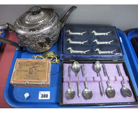 A Highly Decorative Electroplated Tea Pot, allover foliate decorated, a modern boxed set of six dog knife rests, cased apostl