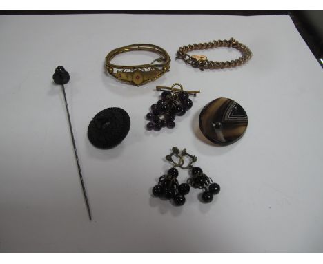 A Victorian Oval Hardstone Panel Brooch, a circular bog oak type brooch, Irish style, a curb style bracelet, stamped "18ct Ro