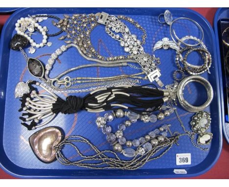 A Selection of Modern Ornate Costume Jewellery, including large heart shape pendants on chains, cameo style pendant, similar 