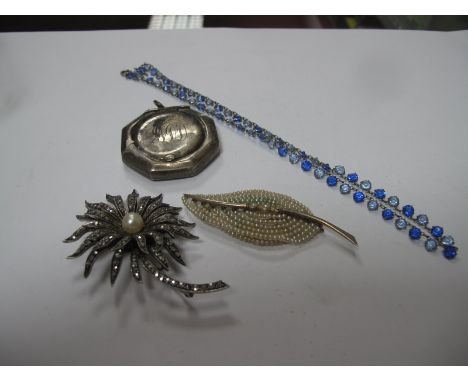 A Vintage Octagonal Ladies Compact, initialled (damages), hallmark worn, a large pearl set marcasite flower brooch, stamped "
