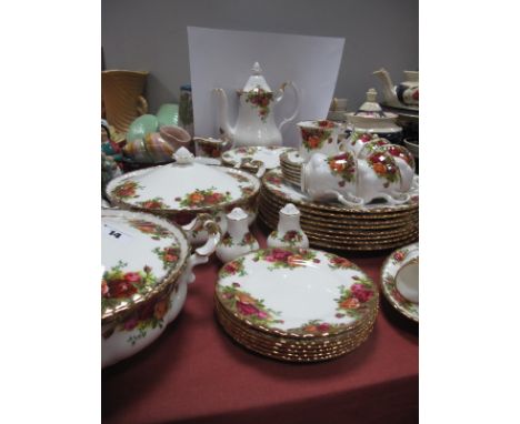 An Royal Albert 'Old Country Roses' Dinner Service, comprising: two lidded tureens, eight dinner plates, eight side plates, s