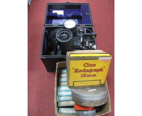 Bell and Howell Model 476 Projector, circa 1930's, in original case, quantity of discs including Charlie Chaplin 'Kife of The