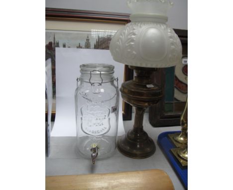 Glass Drink Dispenser, brass oil lamp, having frosted shade.
