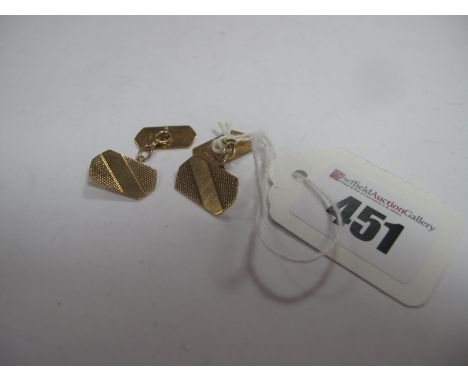 A Pair of Chester Hallmarked 9ct Gold Gent's Cufflinks, the geometric engine turned panel to chain suspension.
