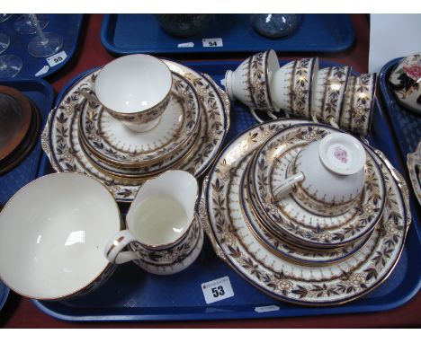 Minton's Tea Service, pattern No. H3815 in blue and gilt: comprising two bread and butter plates, six each tea plates, cups a