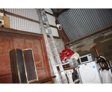A large aluminium extending ladder 