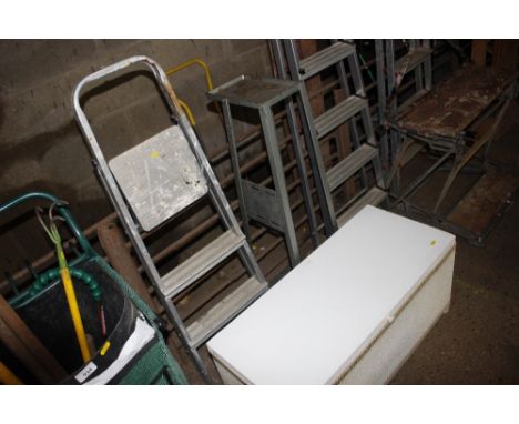 An aluminium step ladder; a metal stand and a Loom ottoman