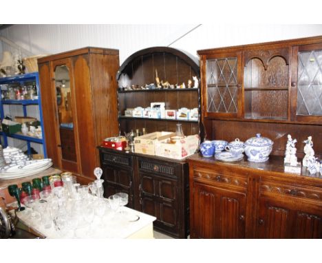 An Ercol style dresser raised on cupboard base fitted two drawers