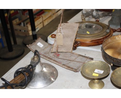 A vintage model of a Kon-tiki type raft