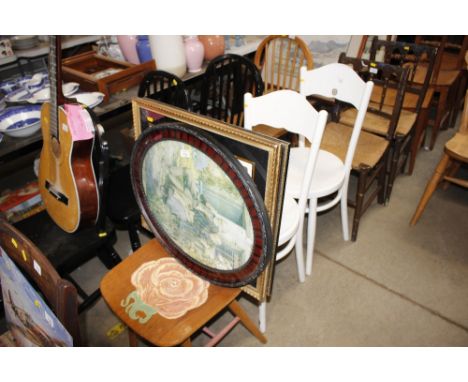 Two white painted chairs together with a painted and decorated stick back chair