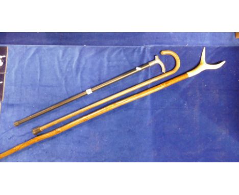 A horn handled thumb walking stick, chrome handled stick and a walking cane (3)