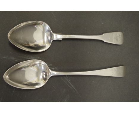 A Georgian silver Old English pattern serving spoon,&nbsp;possibly&nbsp;by W P, Exeter 1794?; together with a fiddle pattern 