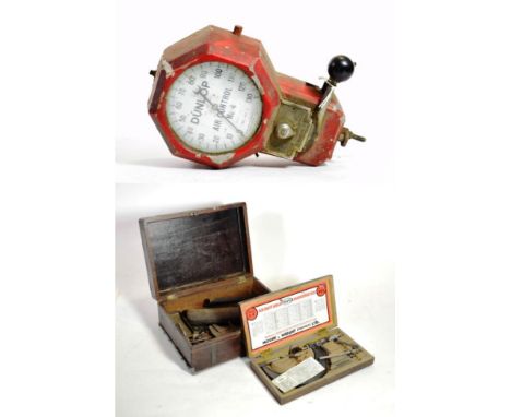 A Vintage Dunlop Air Control No.4 Metal Cased Tyre Inflator, with red painted case and adjustable handle for Inflate and Defl