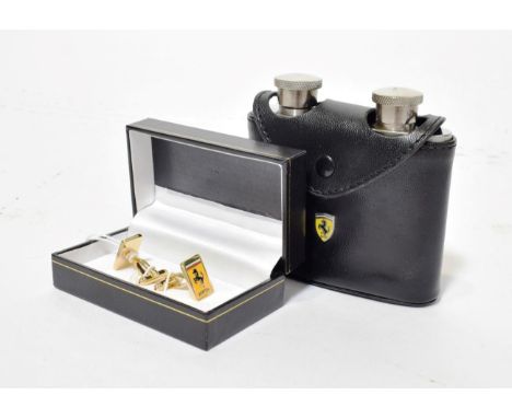 A Pair of Gold Plated and Enamelled Cufflinks, with Ferrari prancing horse emblem, unused, in presentation case; and A Ferrar