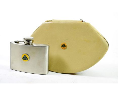 Lotus Interest: A 1950/60 Accessory Cream Leather Manicure Set; and A 1970's Stainless Steel 4oz Drinks Flask for the Lotus S