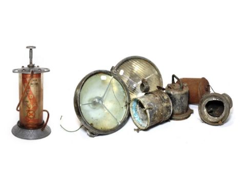 A Vintage Redex Workshop Oil Additive Dispenser, the glass cylindrical body with metal carrying handles and circular base sta