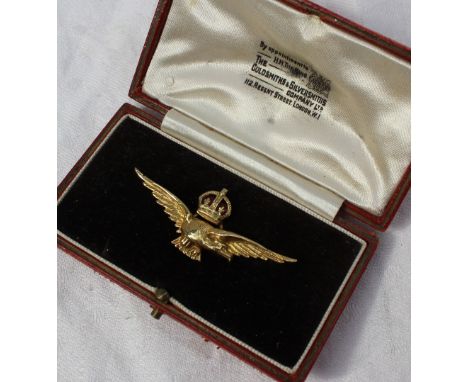 A yellow metal pathfinder brooch in the form of a red enamel crowned eagle, marked 14ct in a Goldsmiths & Silversmiths compan