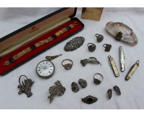 A white metal open faced fob watch together with marcasite jewellery, powder compact, penknives etc