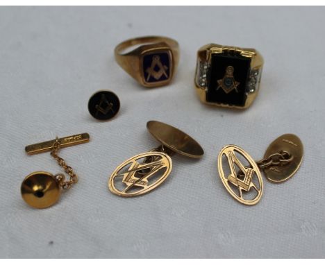 Of Masonic interest - A 9ct yellow gold and blue enamel ring together with a pair of 9ct yellow gold masonic cufflinks, a Mas