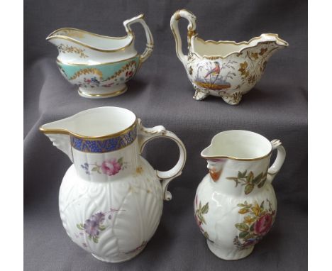 A Coalport "Caughley mask-head jug" together with a Royal Worcester mask jug, and two hand painted sauce boats