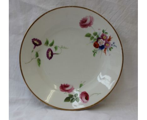 A Swansea porcelain plate, the gilt line rim around a plain border painted with three sprays of garden flowers, impressed Swa