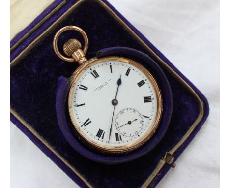 A 9ct yellow gold open faced keyless wound pocket watch, the enamel dial with Roman numerals and a seconds subsidiary dial in