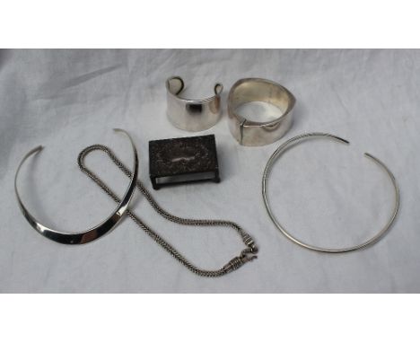 A silver slave bangle together with a silver match box holder, white metal necklaces, etc marked 925, approximately 214 grams