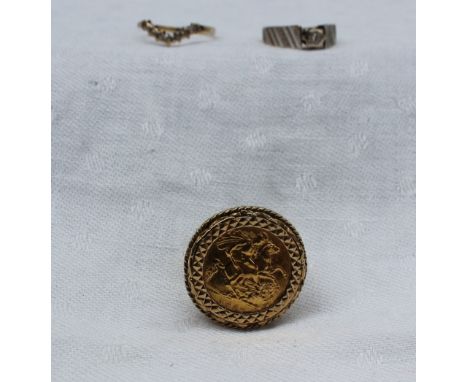 An Elizabeth II gold half sovereign dated 1982 in a 9ct gold ring mount together with a solitaire diamond ring in an 18ct whi