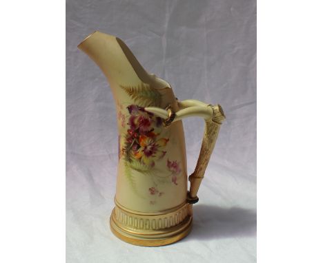 A Royal Worcester porcelain ewer with a faux antler handle transfer and infil decorated with flower heads and ferns to an ivo