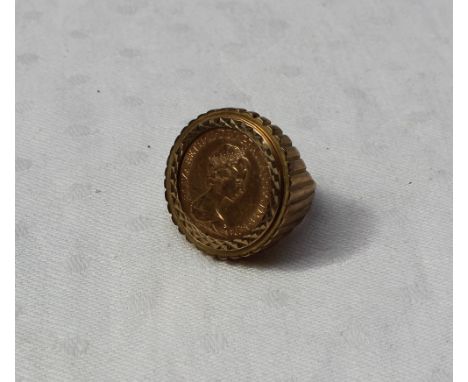 An Elizabeth II gold sovereign, dated 1976, mounted in a 9ct gold ring mount, approximately 17 grams